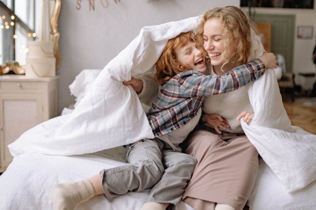 Mom and daughter laughing